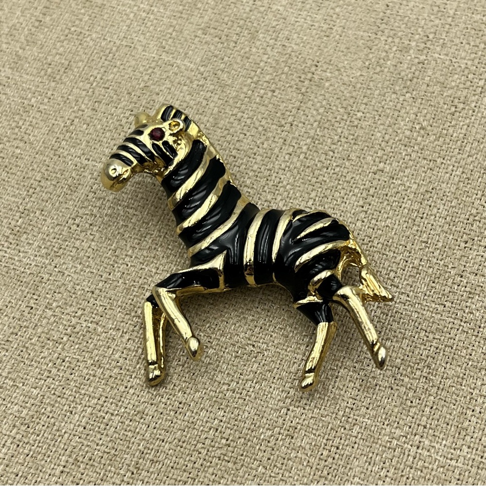 Vintage Black enamel gold tone zebra brooch